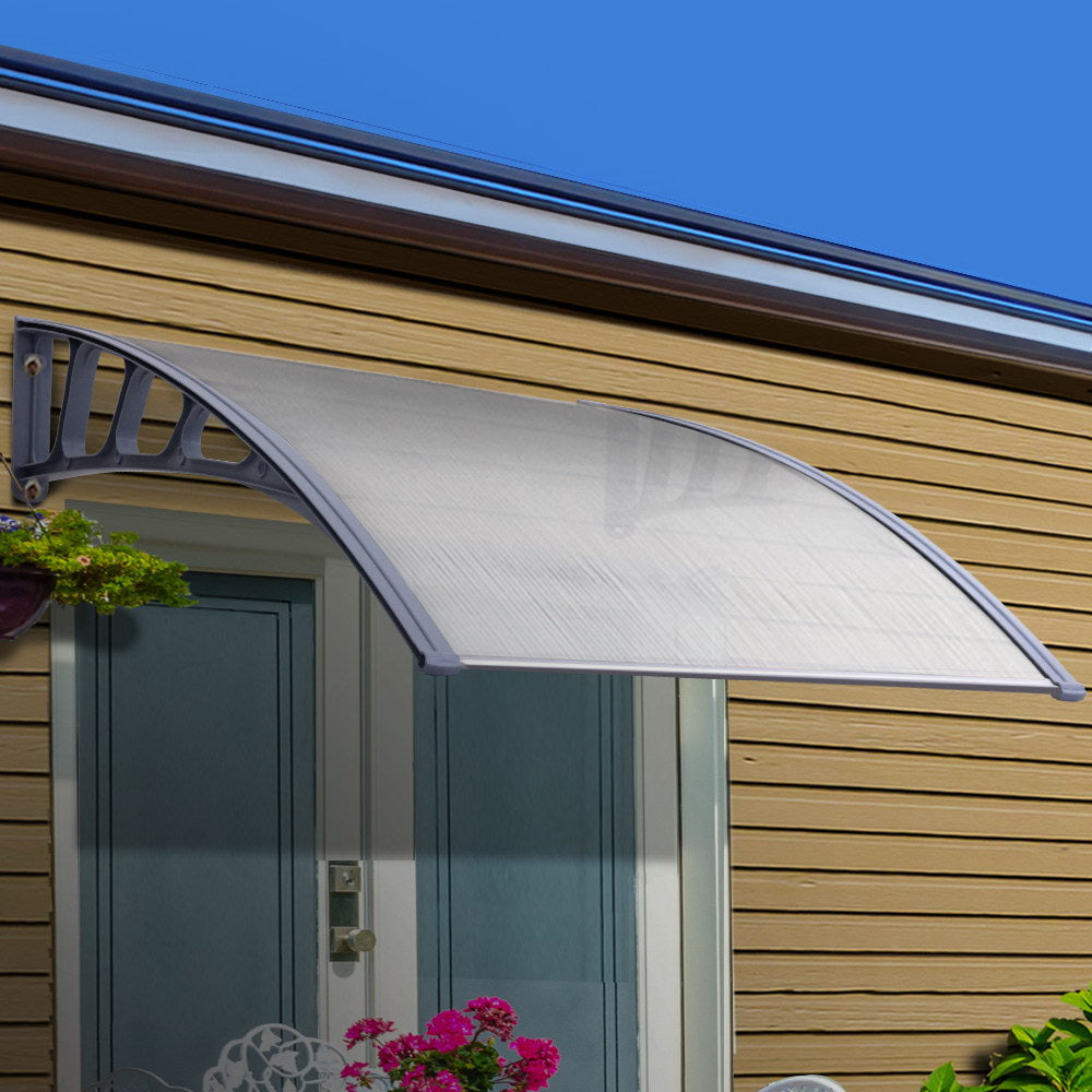 Upgrade your door or window with our Instahut Window Door Awning Canopy 1.5mx4m Transparent Sheet Grey Plastic Frame. Protect your home from the sun and rain while adding value with this DIY-friendly awning. Made with a 5mm thick polycarbonate panel, it is perfect for home or office use and can also serve as a door canopy or balcony cover.