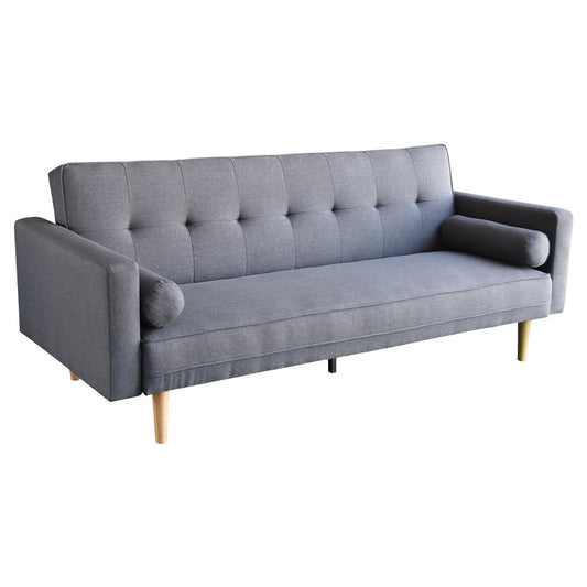A dark grey linen sofa bed with tufted backrest, two pillows, and wooden legs.