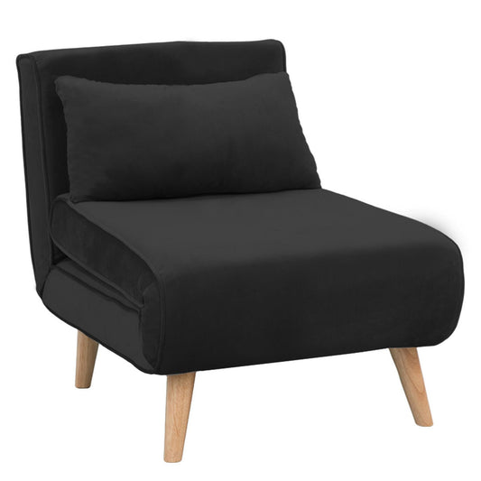 A black faux velvet adjustable corner sofa chair with a solid wood frame and a cushion on a leg, designed to convert into a bed.