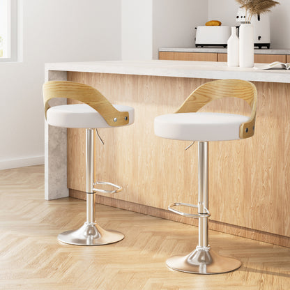 Two white bar stools with adjustable height, curved bentwood seat, and solid semi-circular footrest in a kitchen setting.