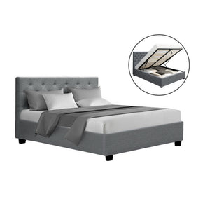 Grey double bed frame with fabric gas lift storage, featuring a tufted headboard and wooden arched slat base.