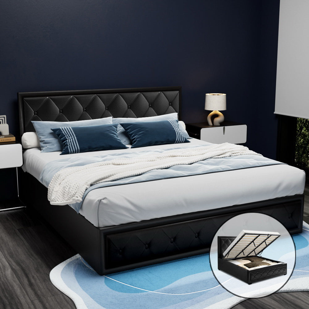 A black king-sized Artiss Tiyo Gas Lift Bed Frame with a tufted headboard and storage space underneath, shown in a room setting with bedding and pillows.