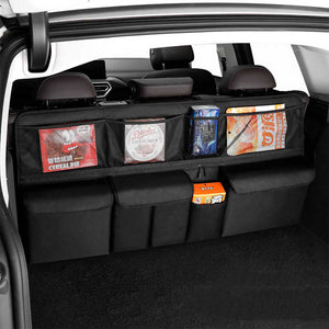 Car Trunk Storage Bag - Large Capacity Oxford Cloth Multi-Purpose Hanging Organizer with Mesh Pockets and Backseat Storage

Maximize your car's storage potential with our Black Car Trunk Storage Bag. Made from durable Oxford cloth, this multi-purpose organizer features mesh pockets and backseat storage for easy access to your essentials on the go. Stay organized and clutter-free with our convenient and spacious storage solution.