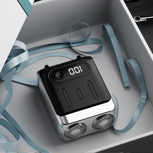 Black Electric Shaver - Compact and Portable

This electric shaver offers a smooth and comfortable shaving experience with its compact and portable design. Featuring a USB rechargeable function, it ensures convenience for travel or daily use. The digital display allows you to monitor battery status, while the ergonomic design ensures easy handling and precise control.