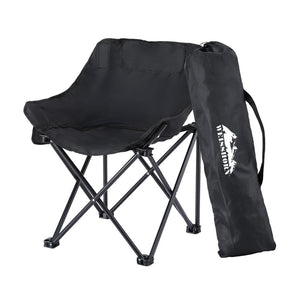 Black folding chair with carrying bag on a white background