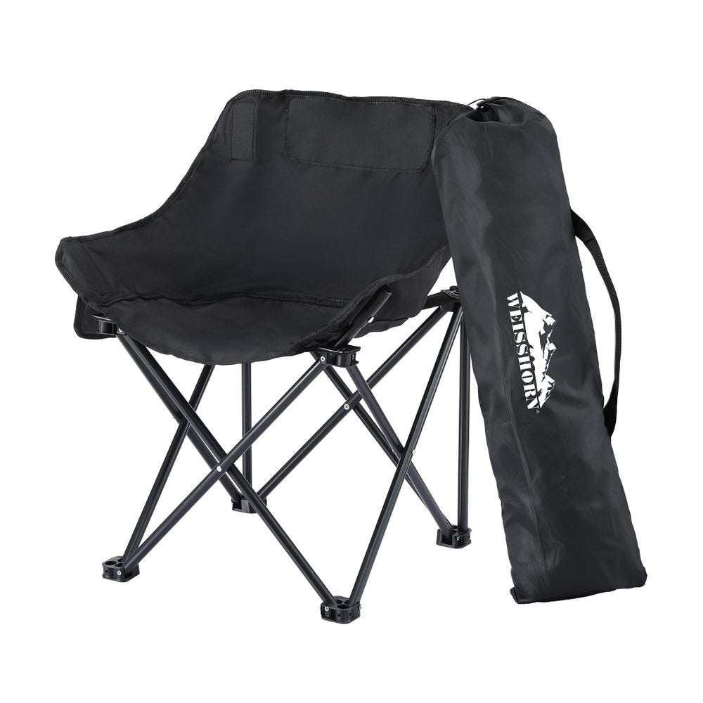 Black folding chair with carrying bag on a white background