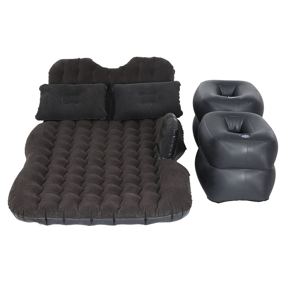 Inflatable car mattress and pillows in charcoal color, with foot pump, laid out on a white background.