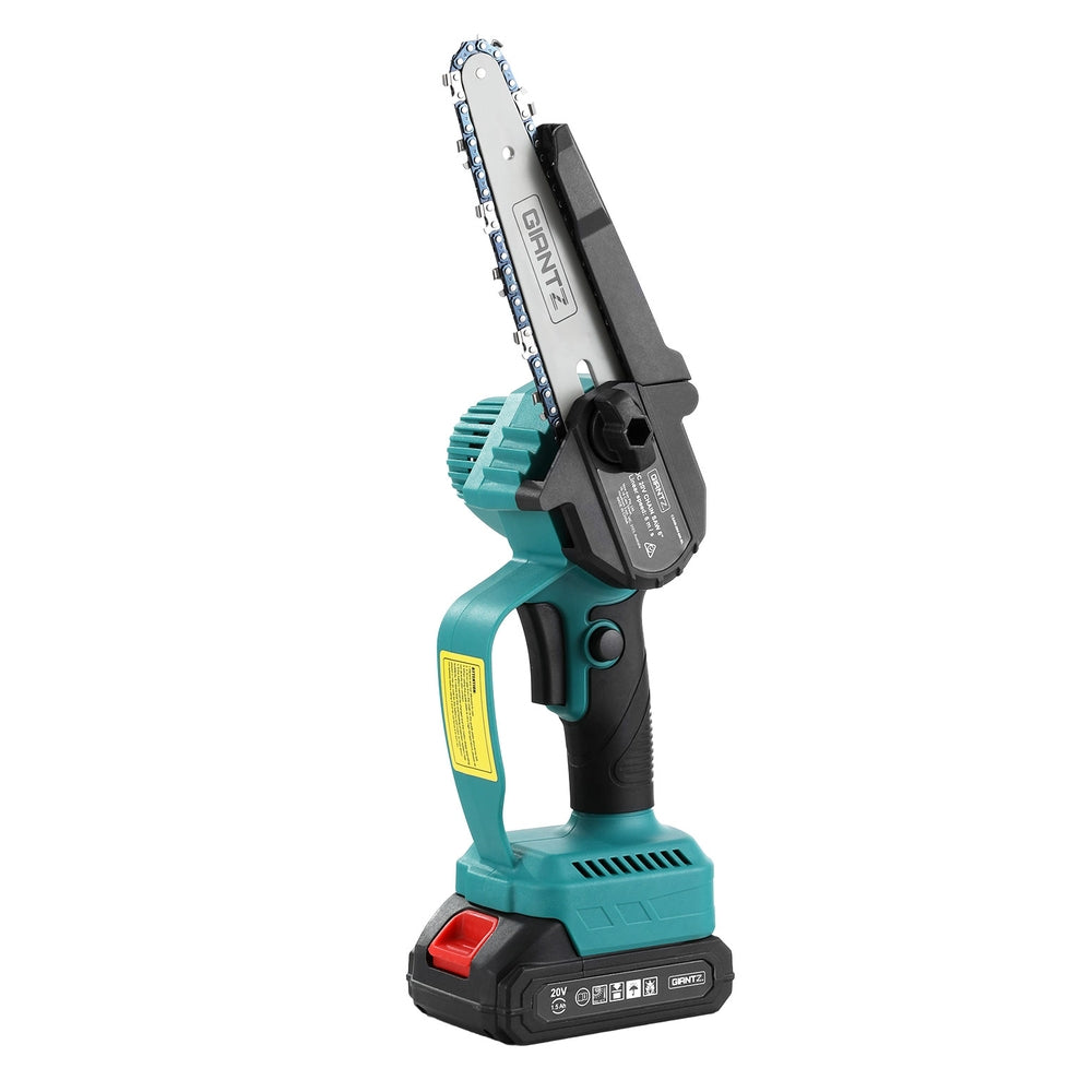 Teal and black power tool with chain saw attachment on a white background