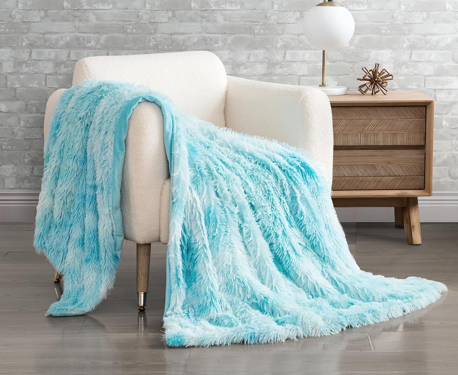 Double-Sided Faux Fur Shaggy Throw Blanket - Blue

Wrap yourself in pure luxury with our Double Sided Faux Fur Shaggy Throw Blanket in Blue! This ultra-soft and plush blanket features a double-sided design for maximum warmth and comfort. Perfect for snuggling up on a cold night or adding a touch of elegance to your home decor. Indulge in the ultimate cozy experience now