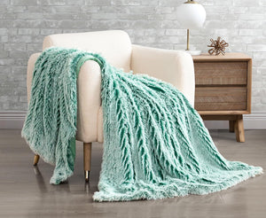 Double-Sided Faux Fur Shaggy Throw Blanket - Emerald

This luxurious throw blanket is the perfect addition to your home. Made with soft and cozy double-sided faux fur, it will keep you warm and comfortable during chilly nights. Its vibrant emerald colour adds a pop of colour to any room, making it both functional and stylish.