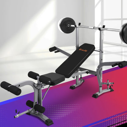 Gym bench with weight plates on a gradient background