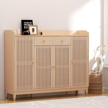 A beige Artiss shoe rack cabinet with shelves, made from particle board with a paper veneer finish, pine wood legs, and metal caps. It has ventilated doors and is storing various items such as shoes and a basket.