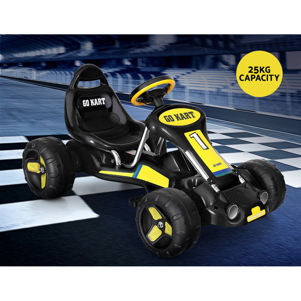 Children's go-kart with black and yellow design on a checkered background