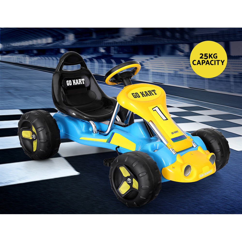 Toy go-kart with black seat and yellow accents on a racing track background