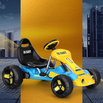 Toy go-kart with 'GO KART' text on a yellow background with cityscape.