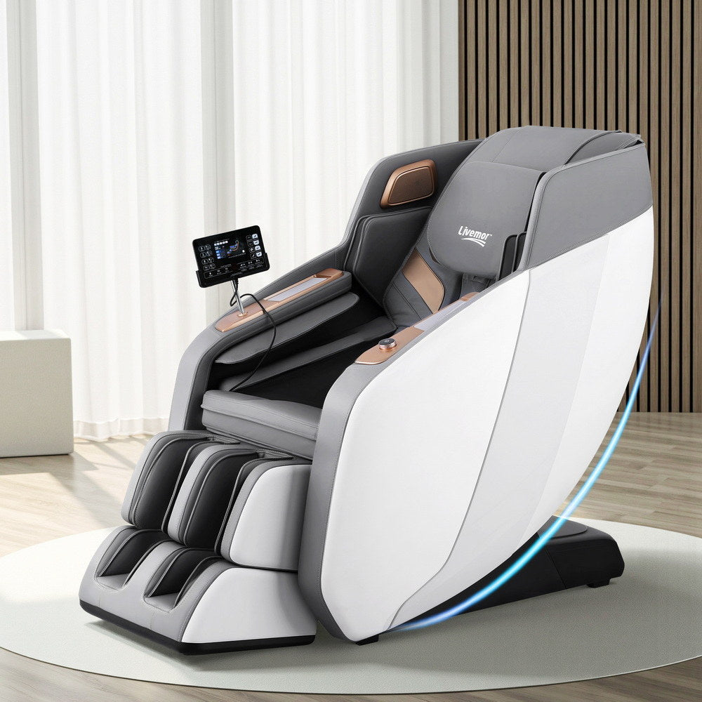 Gray massage chair with control panel in a modern room