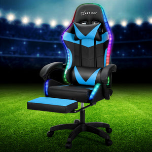 Artiss Massage Gaming Office Chair in blue and black with a footrest, situated in a stylized setting with LED lights in the background.