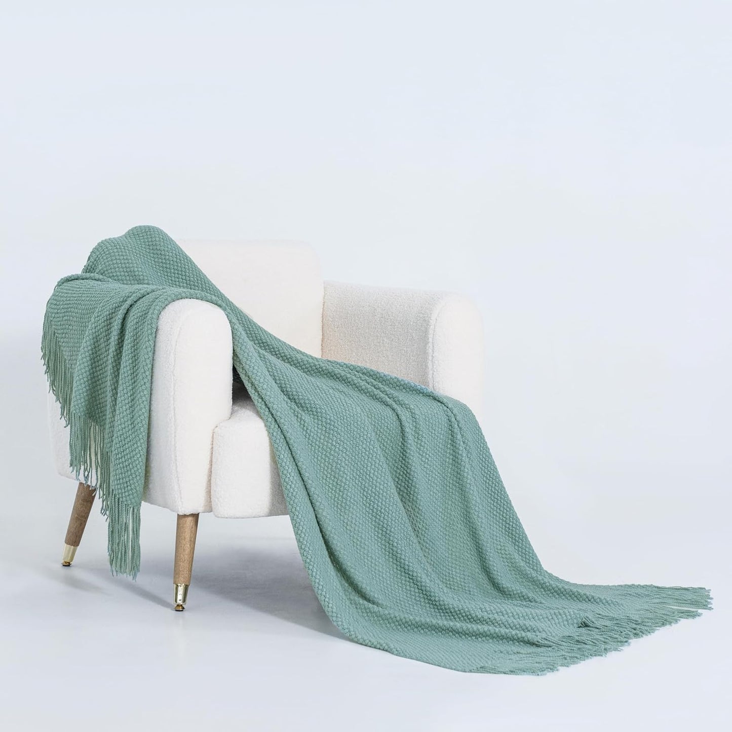 Micro Plush Knitted Woven Throw Blanket - Seafoam

Wrap yourself in luxurious comfort with our Micro Plush Knitted Woven Throw Blanket in Seafoam. Made from soft and cozy material, this blanket is perfect for snuggling up on chilly nights. Its knitted and woven design adds a touch of sophistication to any room while keeping you warm and cozy. Upgrade your relaxation game today