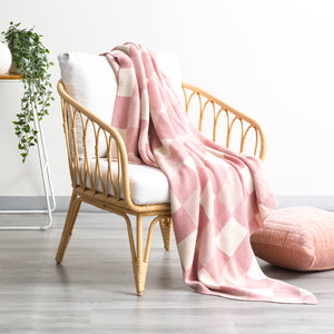 Newport Checkered Cotton Knitted Blush Throw by Renee Taylor

Wrap yourself in luxury with the Newport Checkered Cotton Knitted Blush Throw by Renee Taylor. Crafted from soft, breathable cotton, this elegant throw features a timeless checkered design that adds a touch of sophistication to any room. Perfect for cozying up on chilly nights or adding a touch of style to your bedding, this throw is a must-have addition to your home.