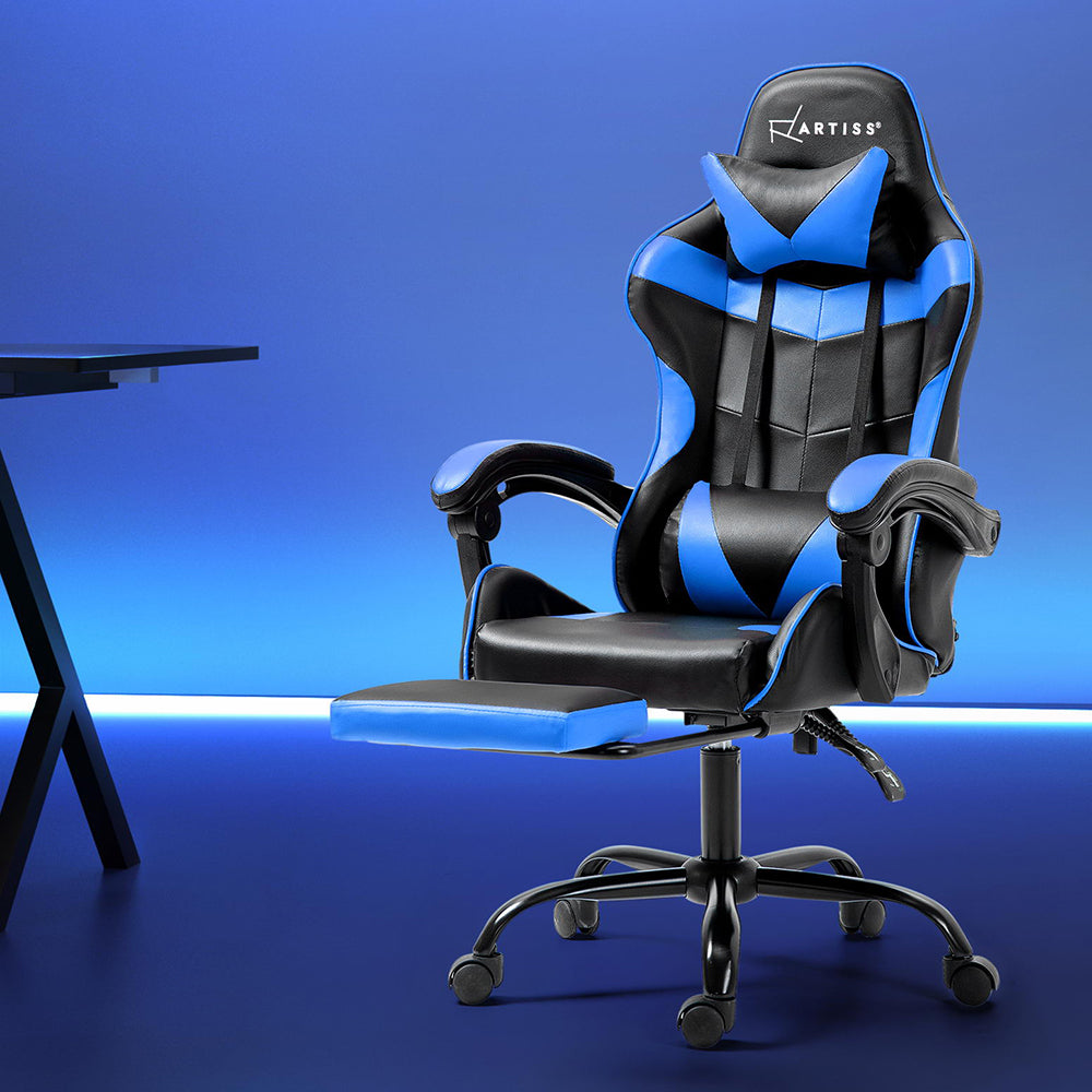 A blue and black Artiss gaming office chair with a footrest, positioned in a room with a clear blue floor.