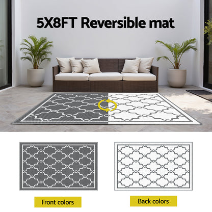 5x8FT reversible mat with front and back color options shown on a living room floor.