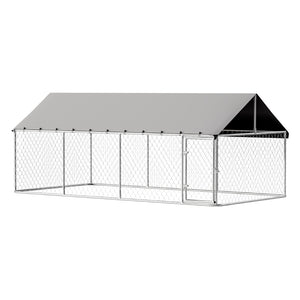 Large outdoor dog kennel with a metal roof on a white background