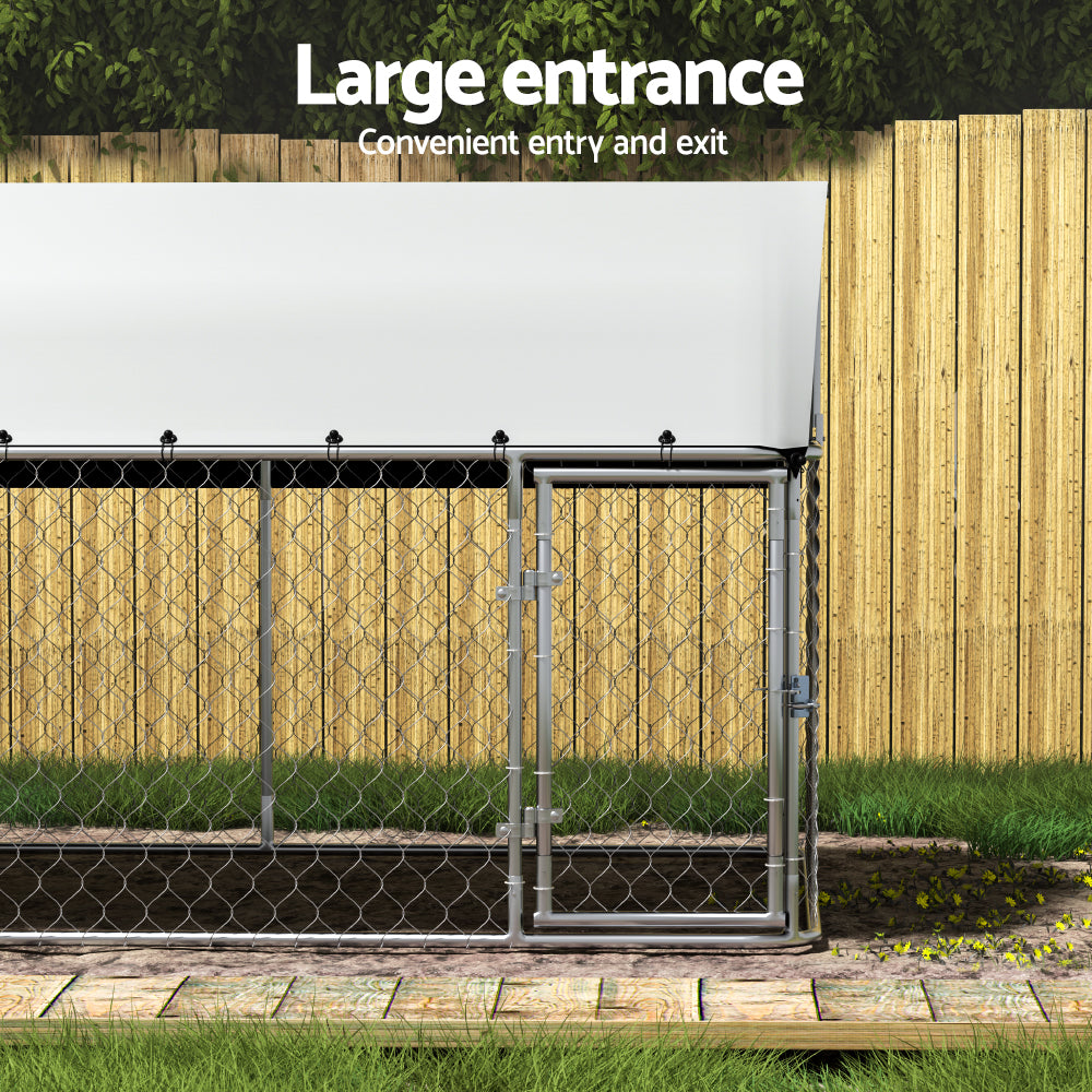 Metal gate with a wooden fence and grass in the background, labeled 'Large entrance'.