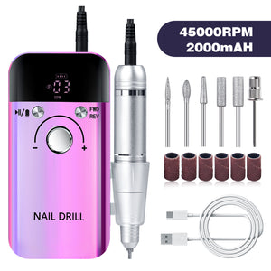 Professional 45000RPM Rechargeable Nail Drill - Achieve Salon-Quality Nails at Home!

Maximize your nail care routine with our Purple High-Speed Portable Nail Drill Set. This high-performance electric nail file boasts 6 nail drill bits for both professional and personal use. Say goodbye to tedious nail maintenance and hello to a powerful and convenient solution.