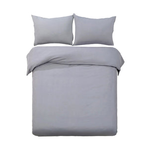A grey quilt cover set including a quilt cover and two pillowcases, displayed on a bed.