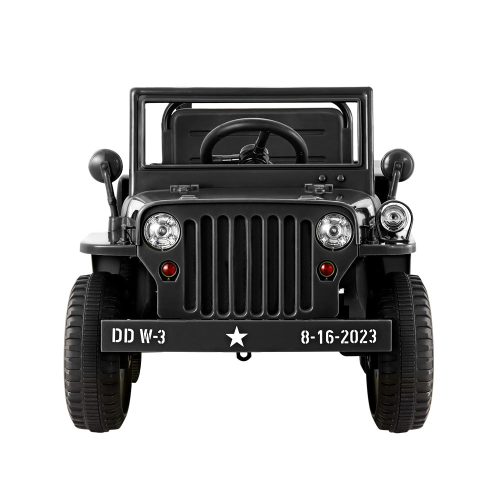 Black vintage jeep with a license plate on a white background