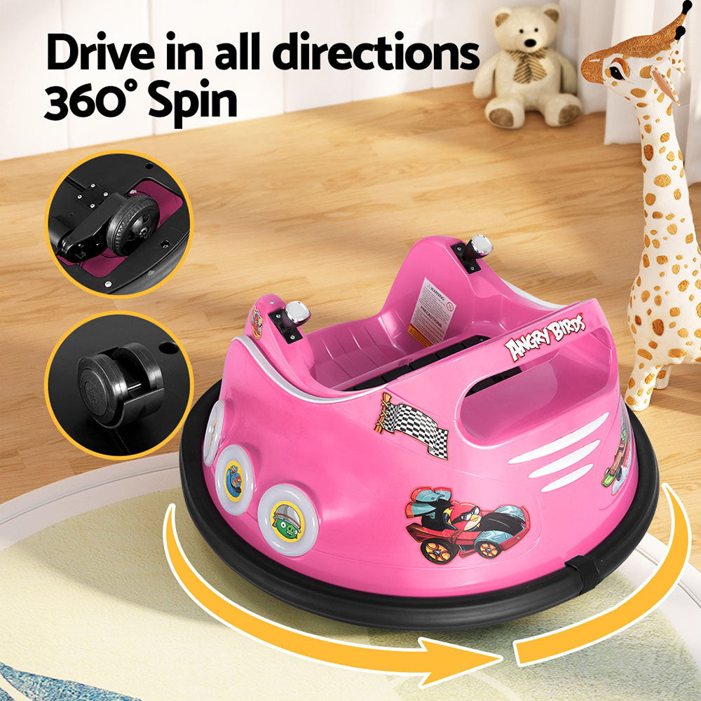 Pink children's bumper car with 360-degree spin feature on a wooden floor.