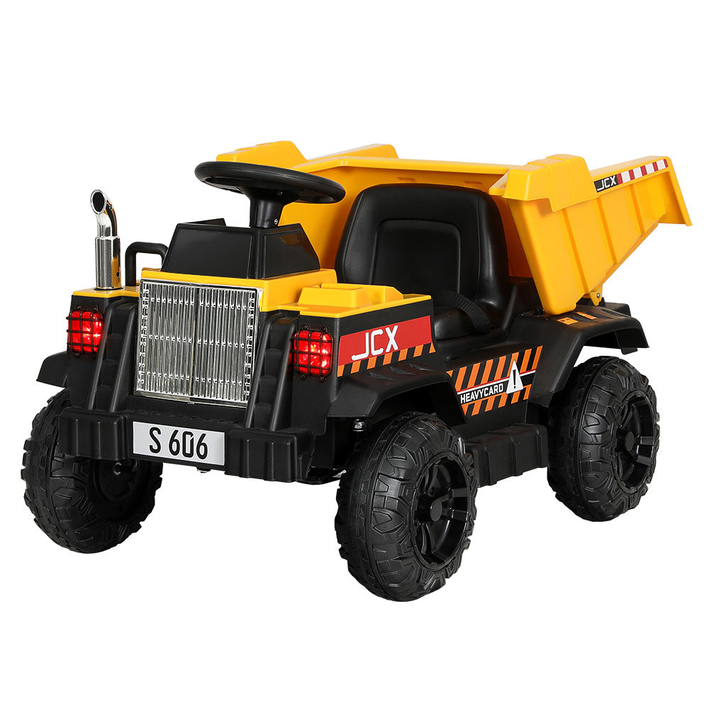 Toy dump truck with black and yellow colors on a white background