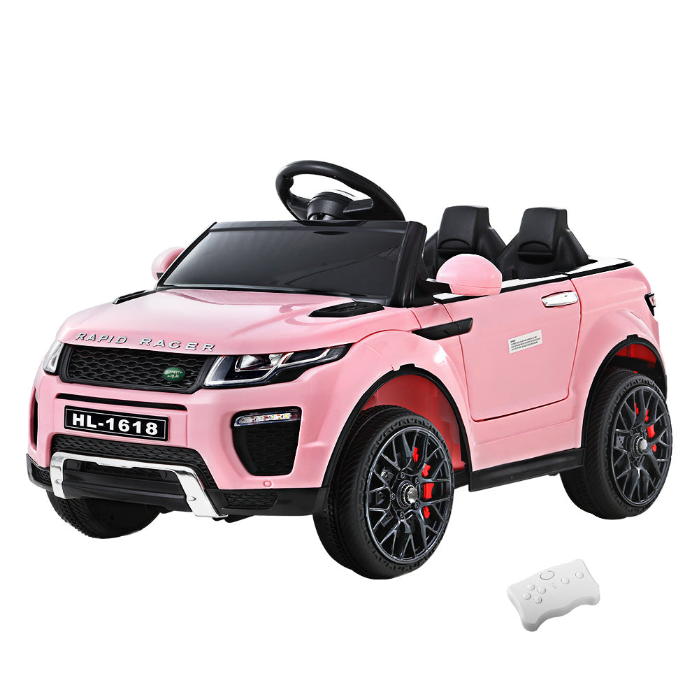 Pink toy car resembling a luxury vehicle with a remote control on a white background