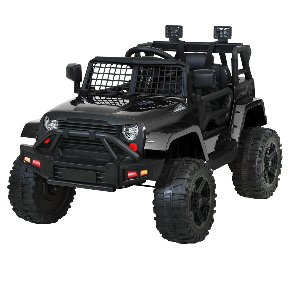 Black toy off-road vehicle with large wheels on a white background