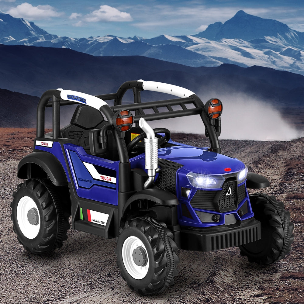 Blue toy truck with black roof on a rocky terrain with mountains in the background
