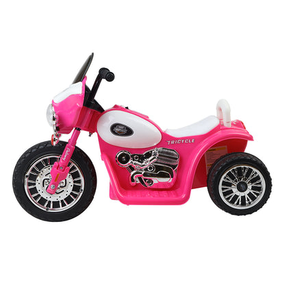 Pink and white toy tricycle on a white background