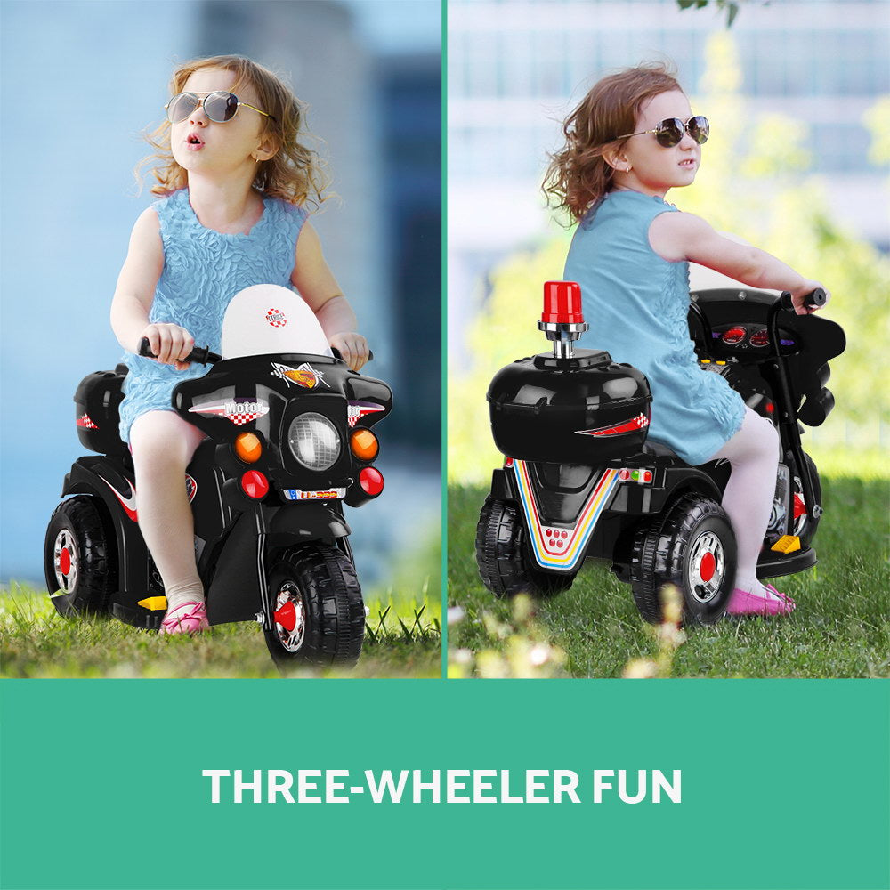 Child riding a three-wheeler toy motorcycle outdoors with 'THREE-WHEELER FUN' text.