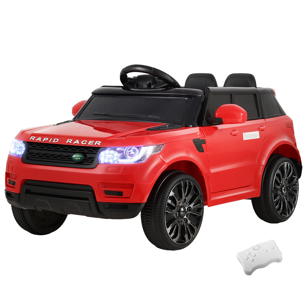 Red toy car with black wheels and a remote control on a white background
