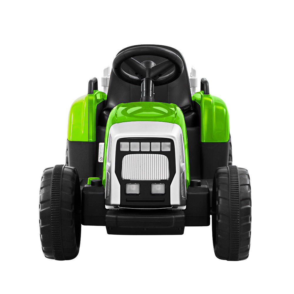Toy tractor with green and black design on a white background