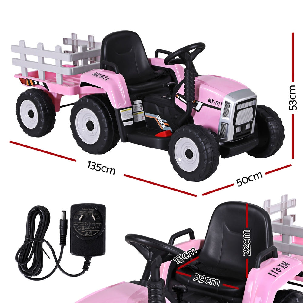 Pink toy tractor with trailer and charging cable on a white background