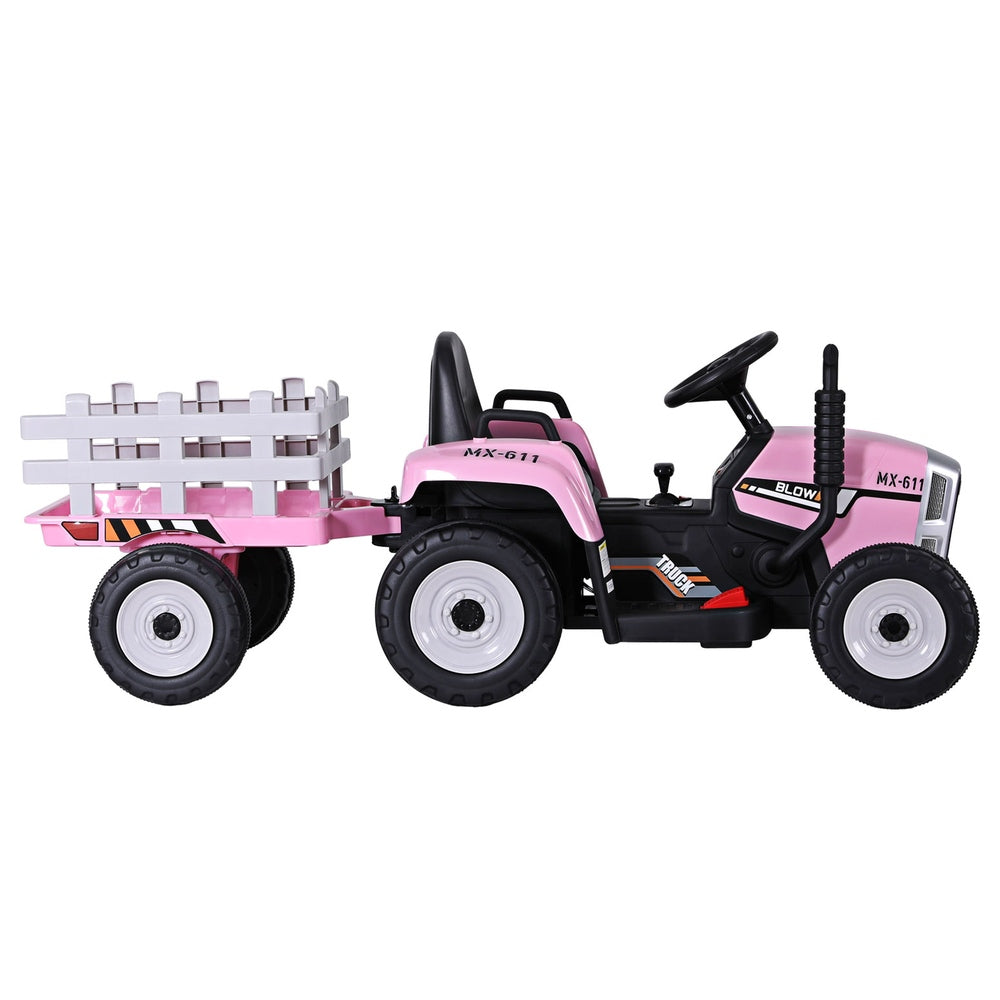 Pink toy tractor with a white trailer on a white background