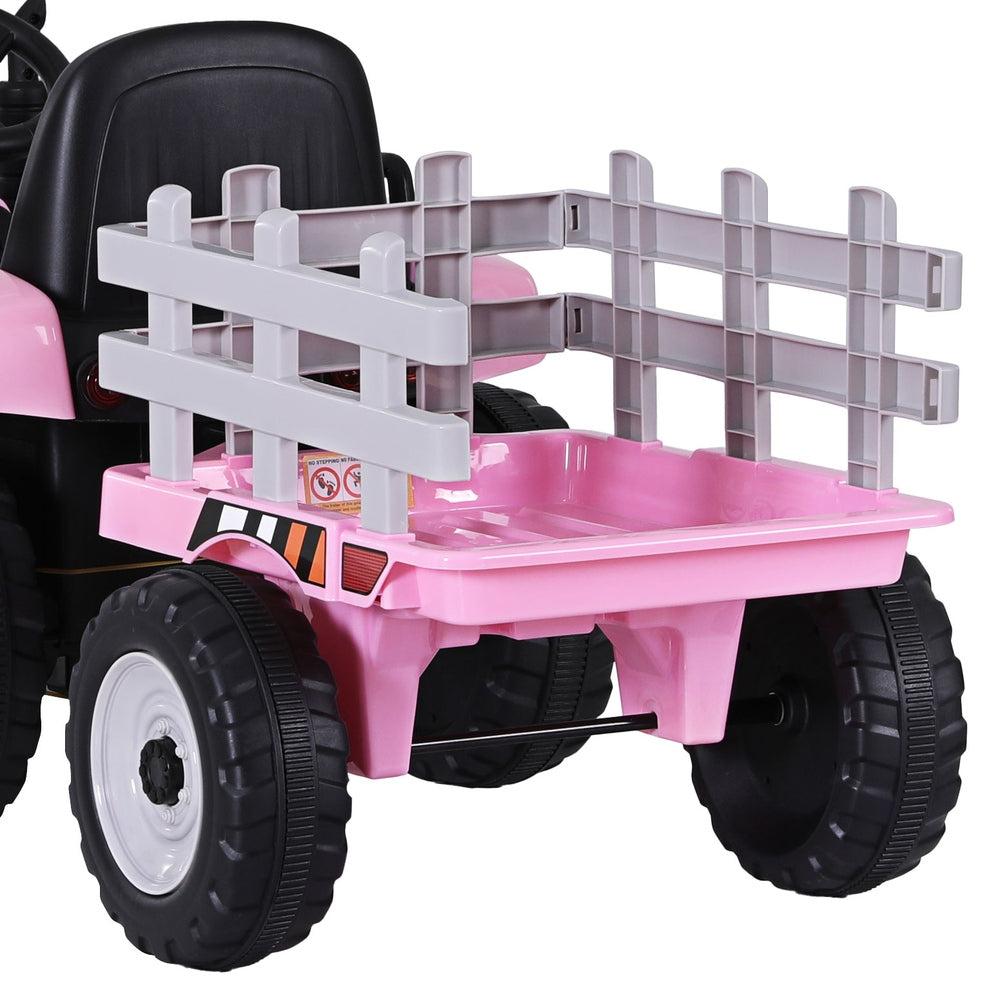 Pink toy truck with a trailer on a white background