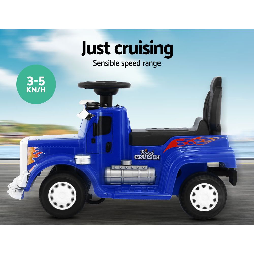 Blue toy truck with 'Just cruising' text and speed indicator on a blurred road background