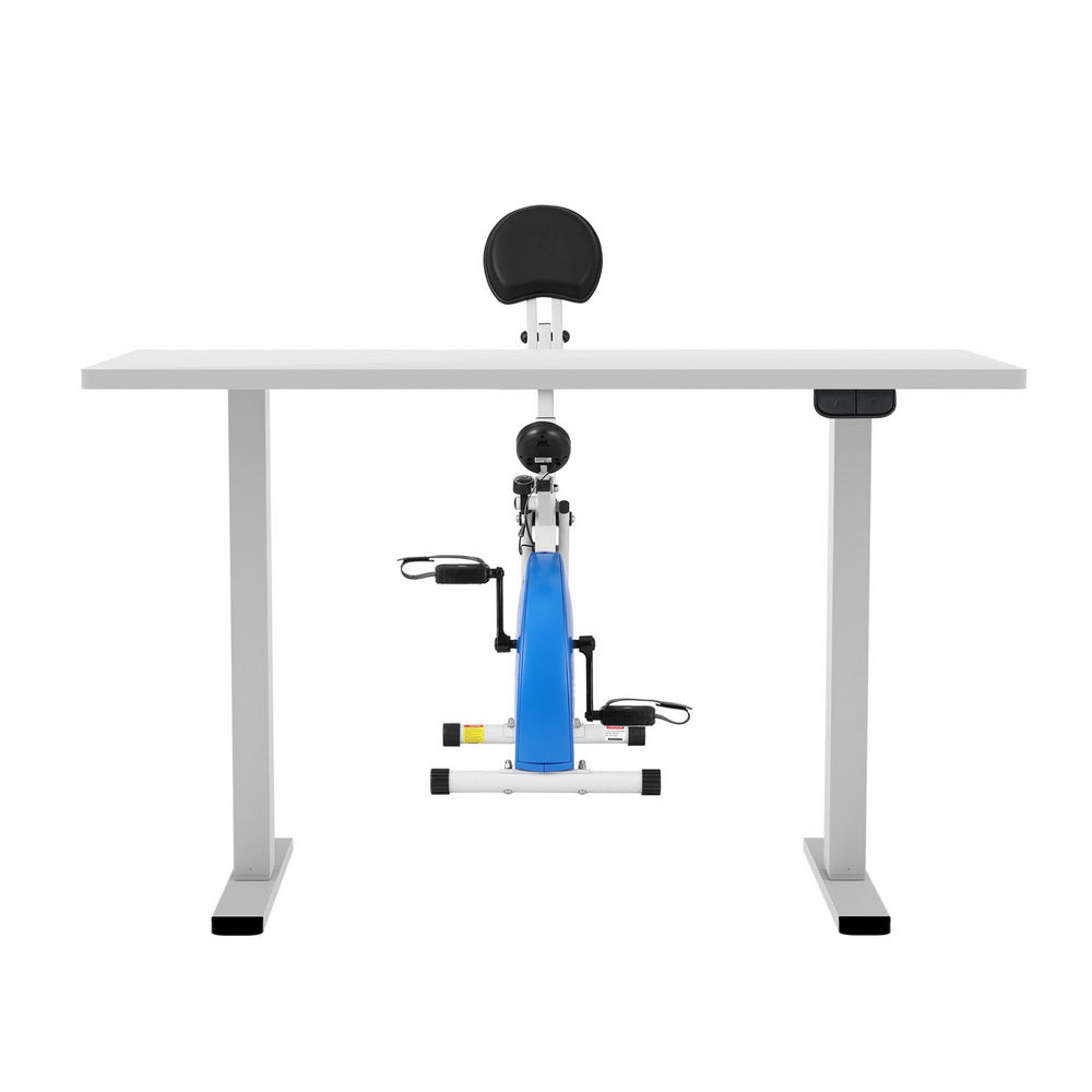 Desk with attached exercise bike on a white background