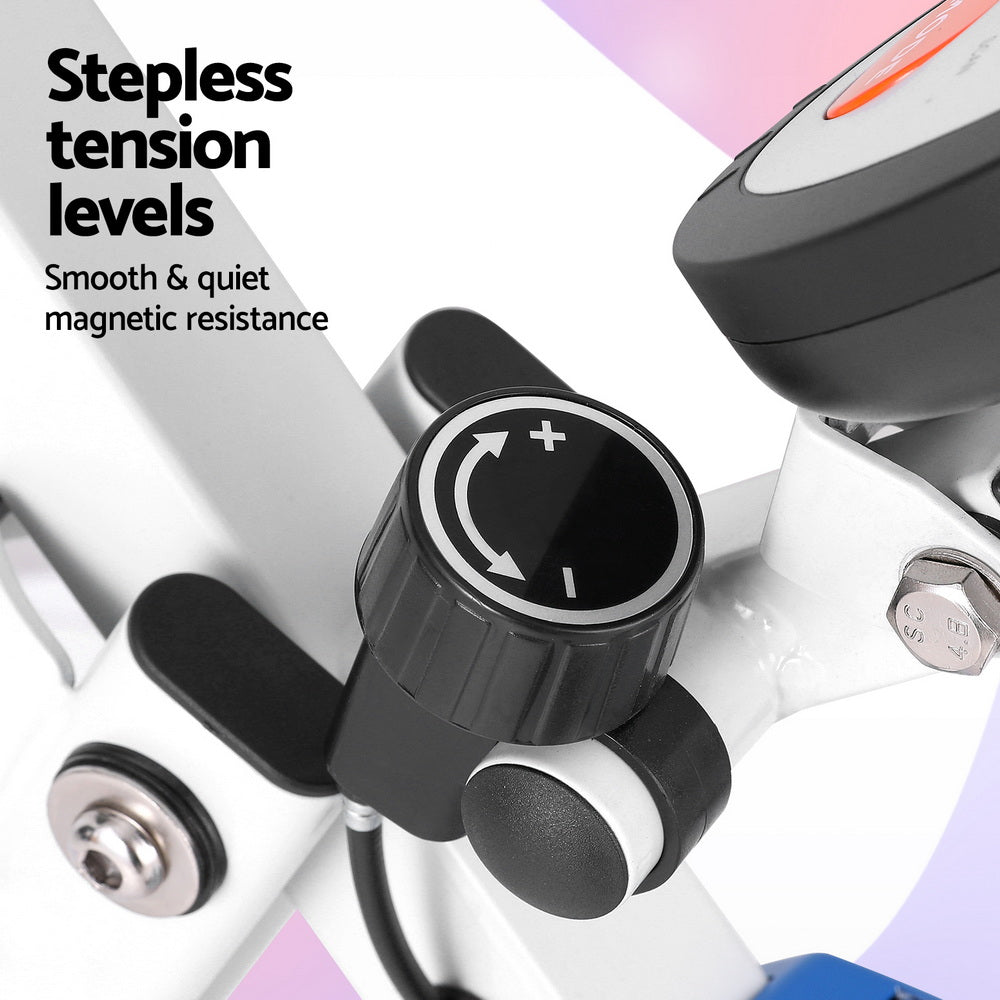 Close-up of a bike's resistance control knob with text about stepless tension levels and magnetic resistance.