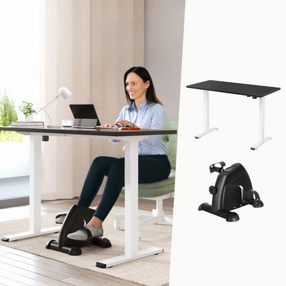 Woman using a standing desk with a small exercise bike attachment, with additional exercise bikes displayed.