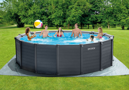 Intex above-ground pool with people enjoying a swim on a grassy lawn
