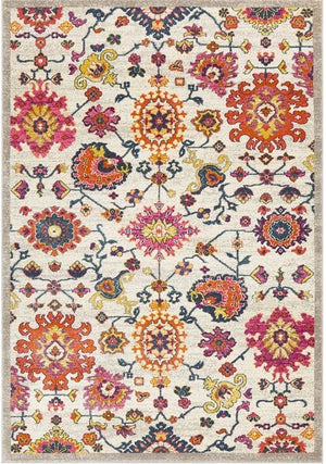 A rectangular multicolored floral pattern area rug.