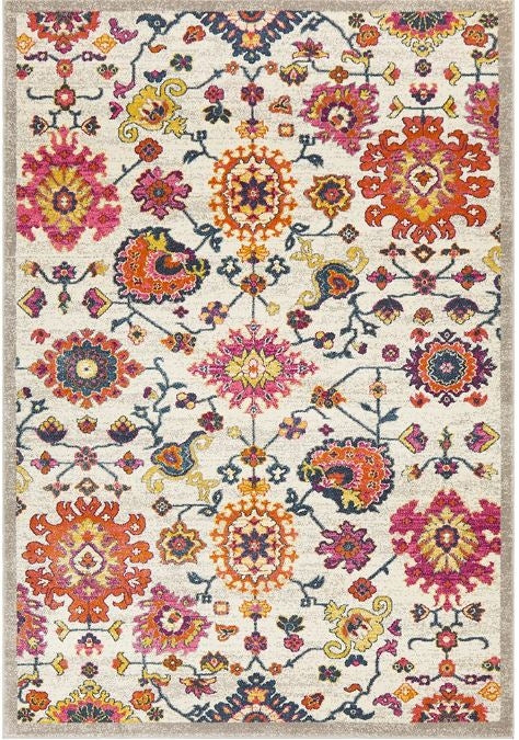A rectangular multicolored floral pattern area rug.