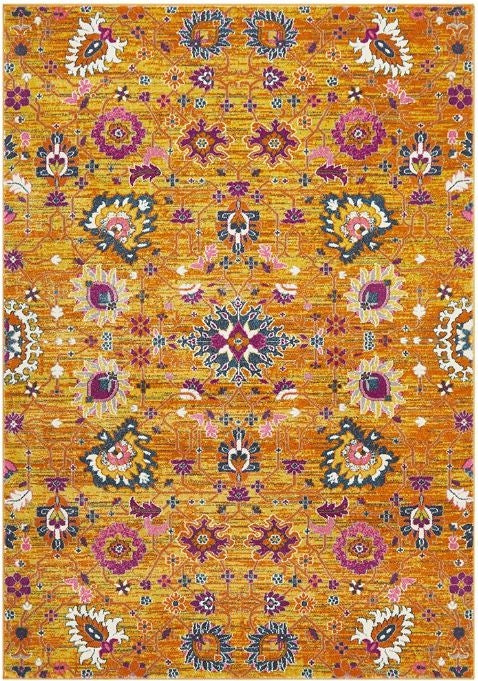 A rectangular orange rug with a floral pattern featuring various colors such as pink, purple, and blue.